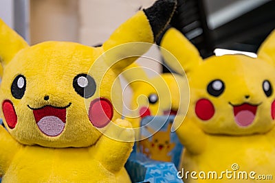 CHESTER, UK - 26TH JUNE 2019: Groups of Pikachu Plushes sit on a shelf waiting for excited children to come buy them Editorial Stock Photo