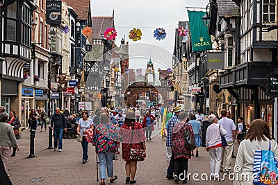 CHESTER, UK - 26TH JUNE 2019: A shot down the busy and famous highstreet in the middle of Chester, UK, June 2019 Editorial Stock Photo