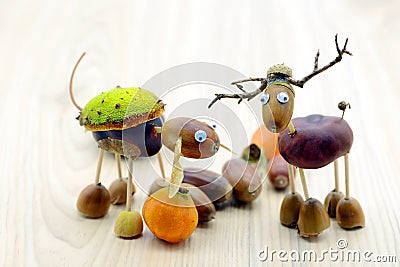 Chestnut figure of a horse and deer Stock Photo