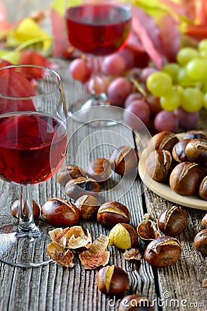 Chestnuts and wine Stock Photo