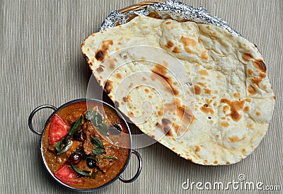 Chettinad chicken curry with Naan Stock Photo