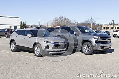 Chevrolet Blazer and Silverado 1500 truck on display at a dealership. Chevy offers a full line of SUVs and pickup trucks Editorial Stock Photo