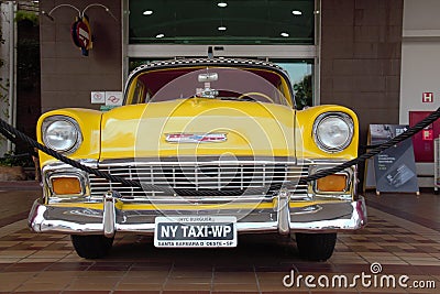Chevrolet 210: Front close, sedan, year 1956, yellow color, taxi. Editorial Stock Photo