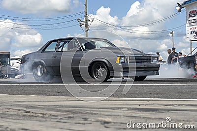 Chevrolet malibu on the track making a smoke show Editorial Stock Photo