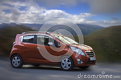 Chevrolet Spark orange car. Stock Photo