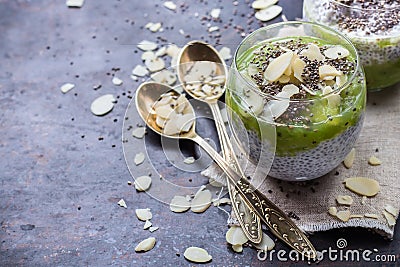 Chia seed pudding with almond milk and fresh fruit topping Stock Photo