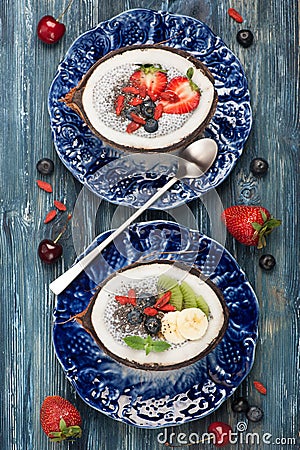 Chia seeds coconut pudding with berries and fruit. Stock Photo