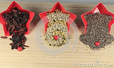 Chia seeds,hemp seeds and goji berries Stock Photo