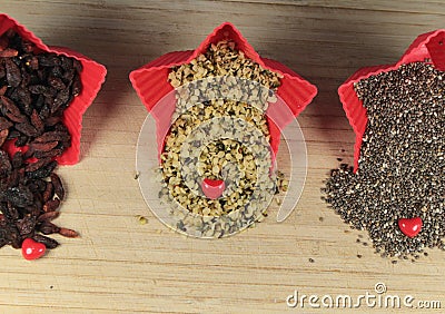 Chia seeds,hemp seeds and goji berries Stock Photo
