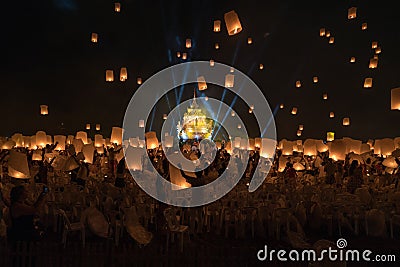 Chiang Mai lantern festival with lantern flying on the sky and crowd of people who is going to release the lanterns Editorial Stock Photo