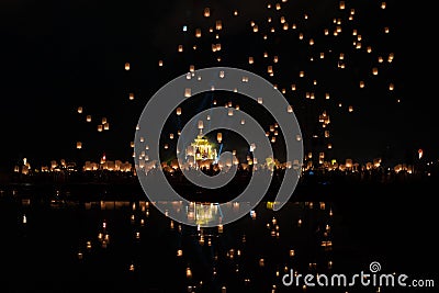Chiang Mai lantern festival with lantern flying on the sky and crowd of people who is going to release the lanterns Stock Photo