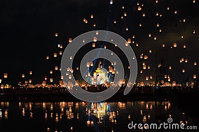 Chiang Mai lantern festival with lantern flying on the sky and crowd of people who is going to release the lanterns Stock Photo