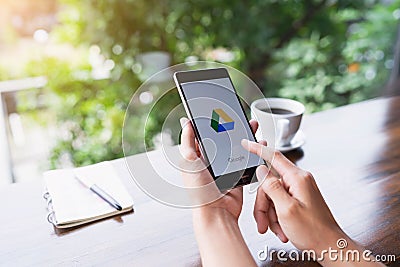 CHIANG MAI, THAILAND - August 18,2018: Woman hands holding HUAWEI with Google Drive apps on screen. Google Drive is a free Editorial Stock Photo