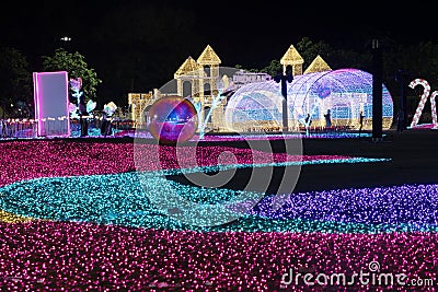 CHIANG MAI, THAILAND - December 12, 2023 : View of flower garden with beautiful lighting during the New Year's festival. Editorial Stock Photo