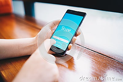 CHIANG MAI, THAILAND - FEB. 16,2019: Woman holding HUAWEI with skype apps. Skype is part of Microsoft, can make video, audio calls Editorial Stock Photo