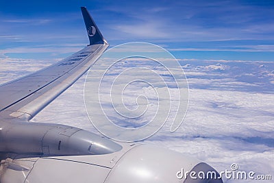 Airplane wing and beautiful sky with cloud view from Shandong Airlines airplane window seat Editorial Stock Photo
