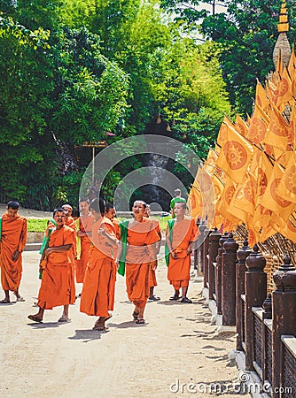Chiang mai, Thailand - May 5, 2013 : novices monk in the buddhist temple, many of novices walking and talking with his friends Editorial Stock Photo