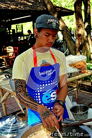Chiang Mai, Thailand: Thai Man Cooking Food Editorial Stock Photo