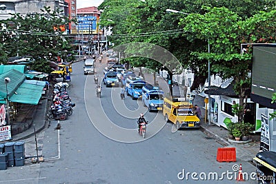 Tuk tuk parked in line on the sidewalk. Editorial Stock Photo