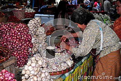 Chiang Mai, Thailand: Woman Selling Garlic Editorial Stock Photo