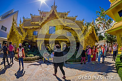 CHIANG RAI, THAILAND - FEBRUARY 01, 2018: Unidentified people around of Golden house at the Wat Rong Khun in Chiang Rai Editorial Stock Photo
