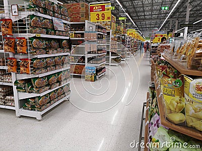CHIANG RAI, THAILAND - MARCH 7, 2019 : Perspective view of aisle in supermarket with products on shelf on March 7, 2019 in Chiang Editorial Stock Photo