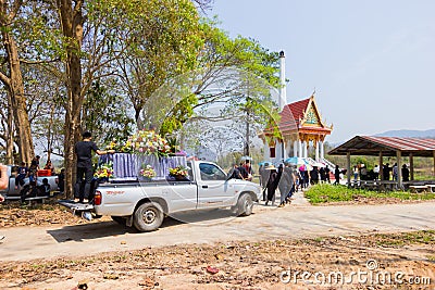 CHIANG RAI, THAILAND - MARCH 2 : pick-up carrying coffin Editorial Stock Photo