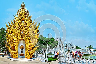 The golden shrine in White Temple complex, Chiang Rai, Thailand Editorial Stock Photo