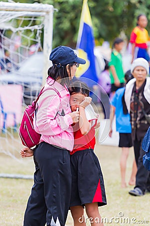 CHIANGRAI, THAILAND - DECEMBER 29: unidentified loser girl crying with her mother after competition on December 29, 2017 in Editorial Stock Photo
