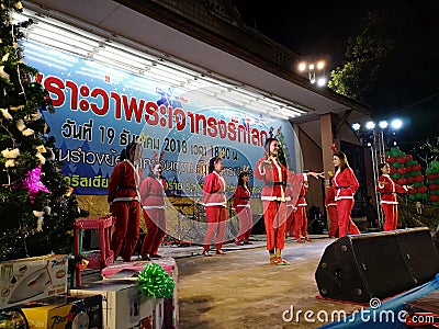 CHIANGRAI, THAILAND - DECEMBER 19: unidentified young asian female teenagers in Santa Claus uniform dancing on stage on December Editorial Stock Photo