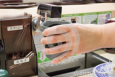 woman pouring hot water Stock Photo