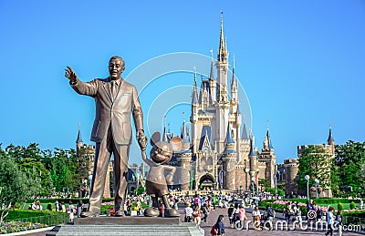 CHIBA, JAPAN: Walt Disney statue with view of Cinderella Castle in the background, Tokyo Disneyland Editorial Stock Photo