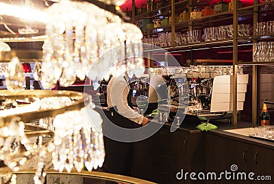 Chic classic crystal chandelier in the interior of a cafe, restaurant Stock Photo