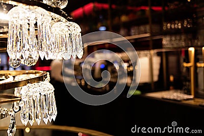 Chic classic crystal chandelier in the interior of a cafe, restaurant Stock Photo