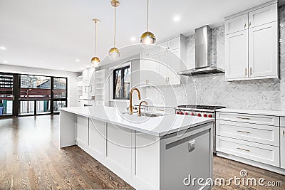 A modern luxurious kitchen with white and black cabinets. Editorial Stock Photo