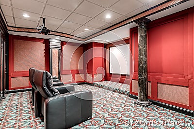 Home theater with red walls and recliners Editorial Stock Photo