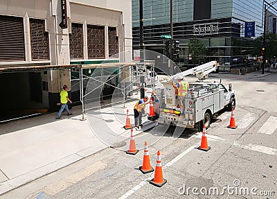 AT and T service workers prepare their equipment for a service call. Editorial Stock Photo