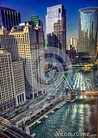 Chicago`s many forms of transportation during a reflective morning Stock Photo