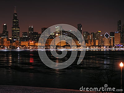 Chicago Skyline at Night with a Reflection in the Water Editorial Stock Photo