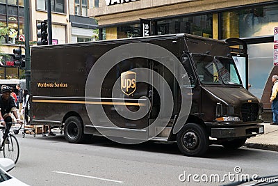 United Parcel Service UPS famous brown logo truck Editorial Stock Photo