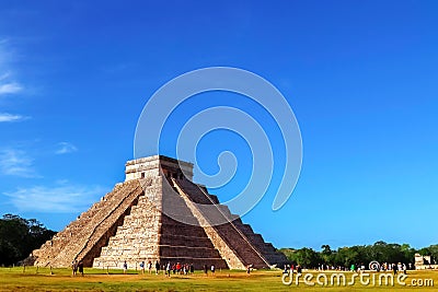 Chichen Itza pyramid on the background of bright blue sky. The most famous archaeological complex of the Maya in Mexico. Editorial Stock Photo