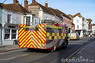 02/05/2020 Chichester, West sussex, UK A British fire engine on the road responding to an emergency Editorial Stock Photo