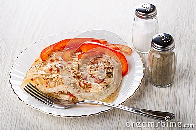 Chicken aspic, sweet pepper, fork in plate, salt, pepper on table Stock Photo