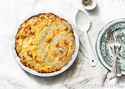 Chicken, bacon and leek cottage pie on a light background Stock Photo