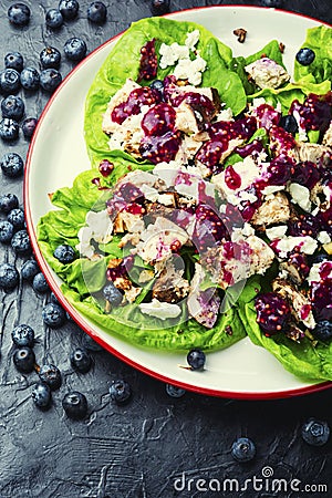 Chicken breast salad, greens, blueberries Stock Photo