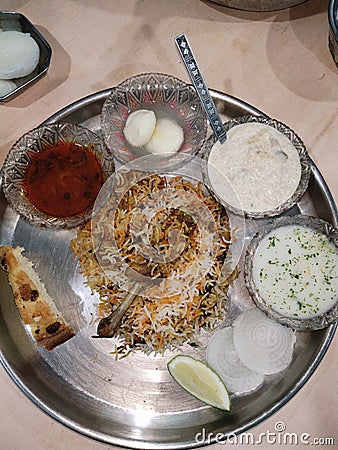 Chicken Briyani, Rasogulla, Khir, Rassa, Kadi, Cake 2 Stock Photo