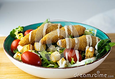 Chicken caesar salad with cheese Stock Photo