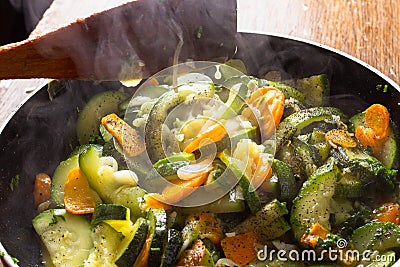Chicken. carrot and zucchini on pan vegetable food, nobody Stock Photo