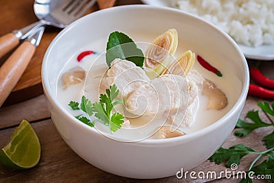Chicken with coconut milk soup and rice, Thai food Tom Kha Kai Stock Photo