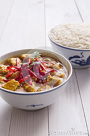 Chicken curry, with onions and chili Stock Photo